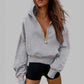 Dames sweatshirt met capuchon en halve ritssluiting