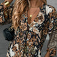 Elegante jurk met V-hals, lange mouwen en print